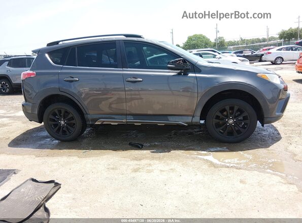 2T3RFREV0JW710317 2018 TOYOTA RAV4 Gray Widok wnętrza z tyłu