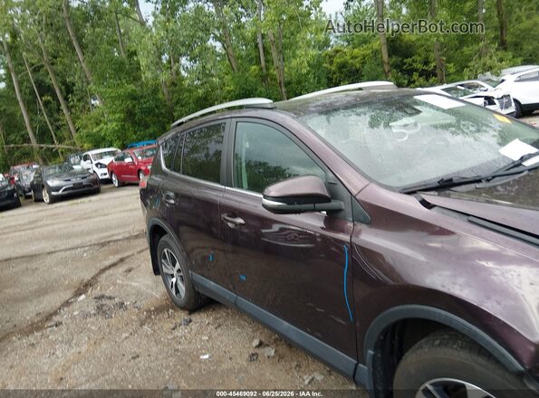 2T3RFREV0JW825371 2018 TOYOTA RAV4 Purple Вид задньої частини салону