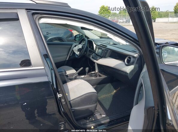 2T3RFREV1GW455315 2016 TOYOTA RAV4 Черный Вид салона спереди