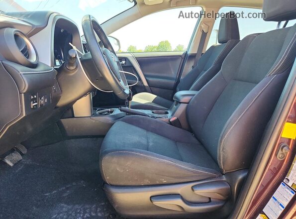 2T3RFREV1HW577075 2017 TOYOTA RAV4 Purple Front interior view