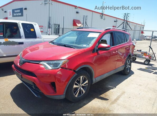 2T3RFREV1HW587704 2017 TOYOTA RAV4 Красный Передняя левая четверть