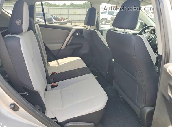 2T3RFREV1HW615193 2017 TOYOTA RAV4 Silver Rear interior view