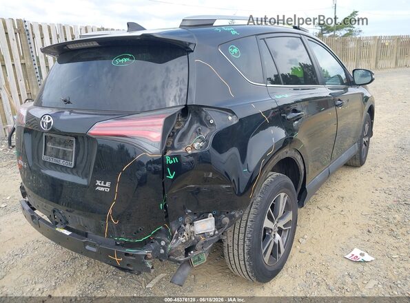 2T3RFREV1JW731869 2018 TOYOTA RAV4 Черный Задняя правая четверть