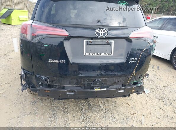 2T3RFREV1JW731869 2018 TOYOTA RAV4 Черный Вид спереди