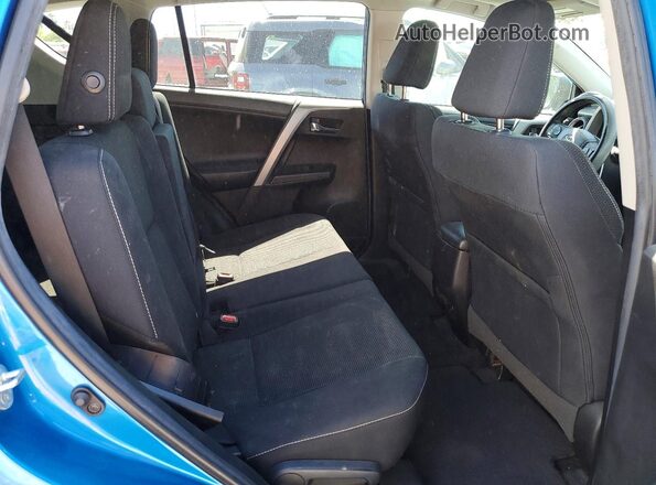 2T3RFREV1JW815111 2018 TOYOTA RAV4 Blue Вид задньої частини салону