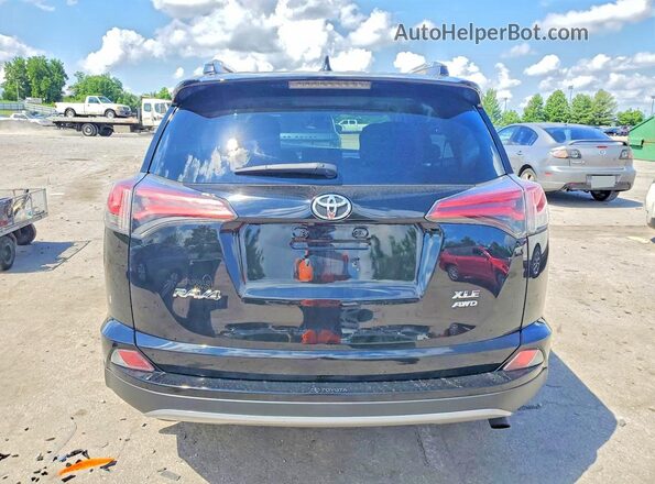 2T3RFREV2HW633587 2017 TOYOTA RAV4 Black Vista trasera