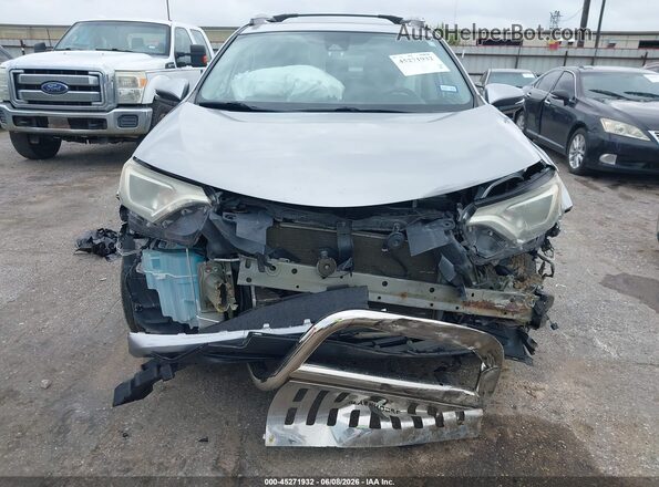 2T3RFREV2HW654312 2017 TOYOTA RAV4 Silver Rear interior view