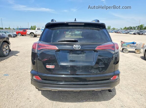 2T3RFREV2JW697862 2018 TOYOTA RAV4 Черный Вид сзади