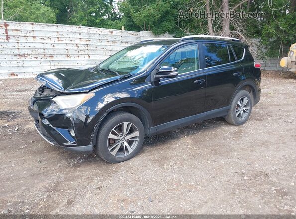 2T3RFREV3GW462444 2016 TOYOTA RAV4 Black Vista tres cuartos delantera izquierda