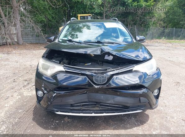 2T3RFREV3GW462444 2016 TOYOTA RAV4 Black Vista frontal