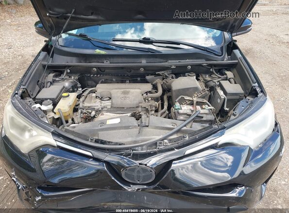 2T3RFREV3GW462444 2016 TOYOTA RAV4 Black Vista trasera