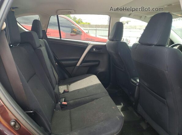2T3RFREV3GW469538 2016 TOYOTA RAV4 Темно-бордовый Вид задней части салона