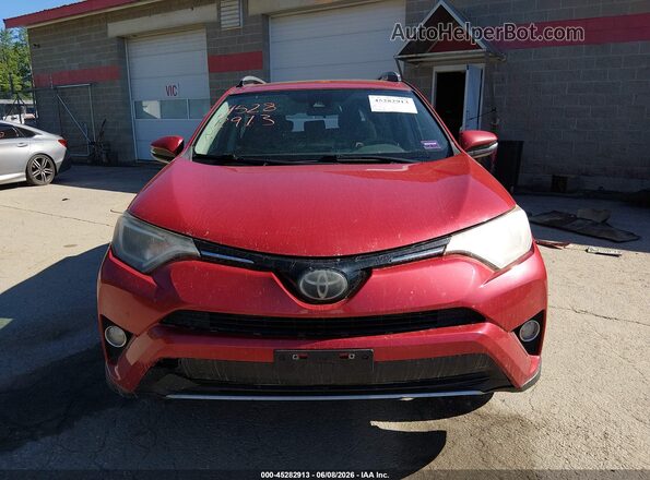 2T3RFREV3HW587932 2017 TOYOTA RAV4 Red Rear interior view
