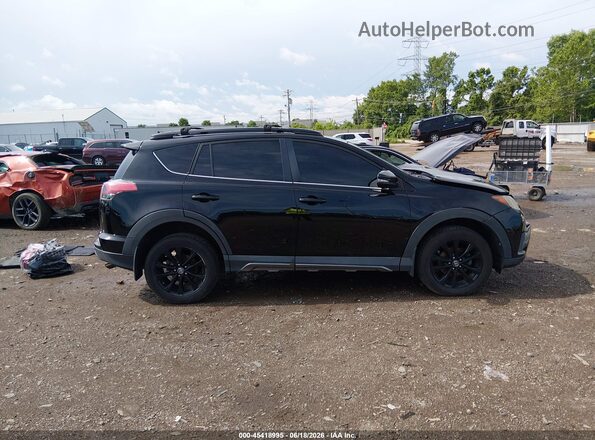 2T3RFREV3JW821198 2018 TOYOTA RAV4 Black უკანა სალონის ხედი