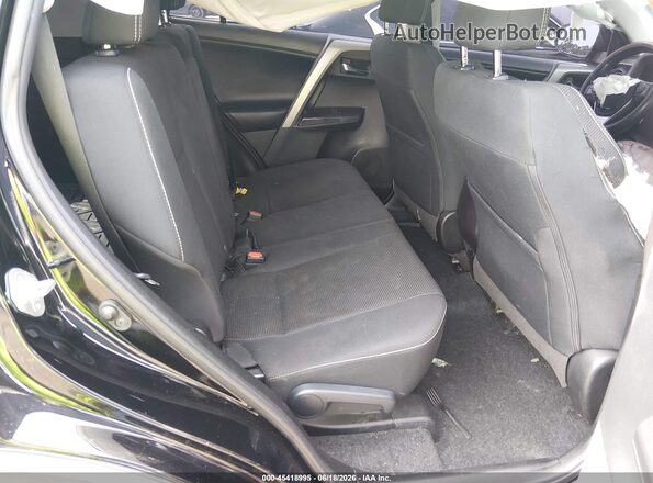 2T3RFREV3JW821198 2018 TOYOTA RAV4 Black VIN კოდის სტიკერის ხედი