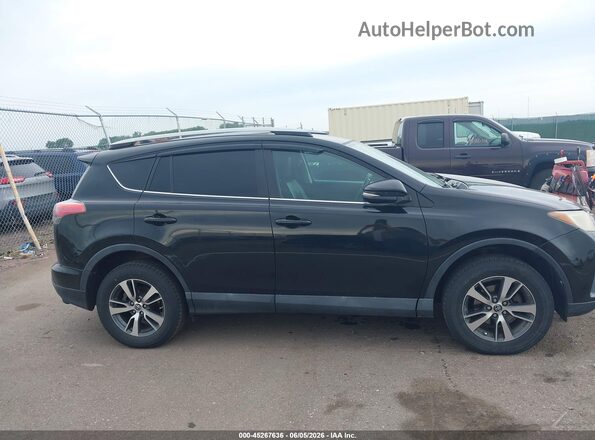2T3RFREV4HW575918 2017 TOYOTA RAV4 Black Vista interior trasera