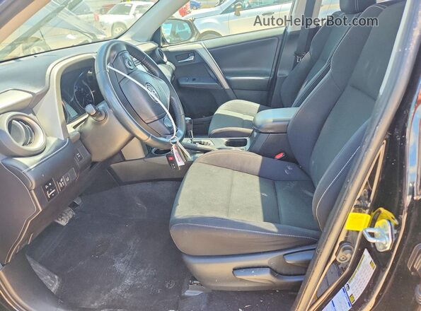 2T3RFREV4JW704794 2018 TOYOTA RAV4 Black Vista interior delantera