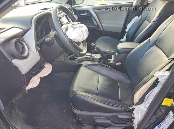 2T3RFREV4JW709770 2018 TOYOTA RAV4 Black Front interior view