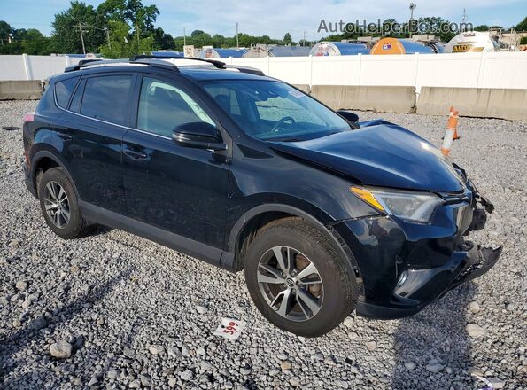 2T3RFREV4JW709770 2018 TOYOTA RAV4 Black Front right