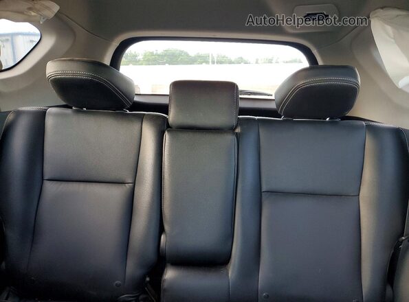 2T3RFREV4JW709770 2018 TOYOTA RAV4 Black Rear seats view