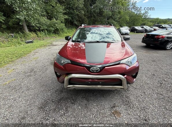 2T3RFREV4JW766535 2018 TOYOTA RAV4 Red Front view