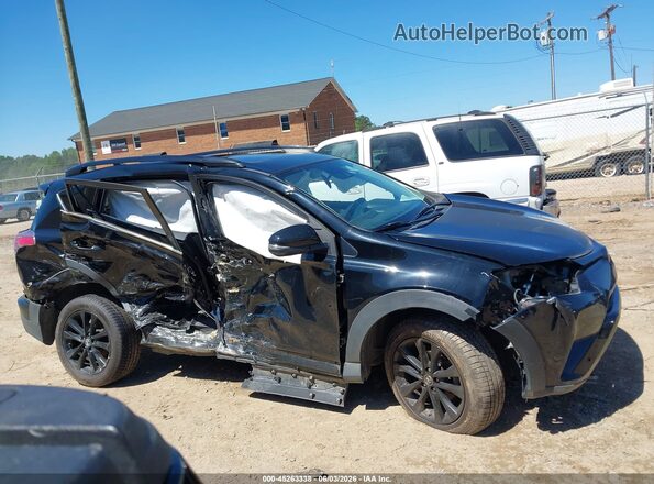 2T3RFREV4JW823543 2018 TOYOTA RAV4 Black Widok wnętrza z tyłu