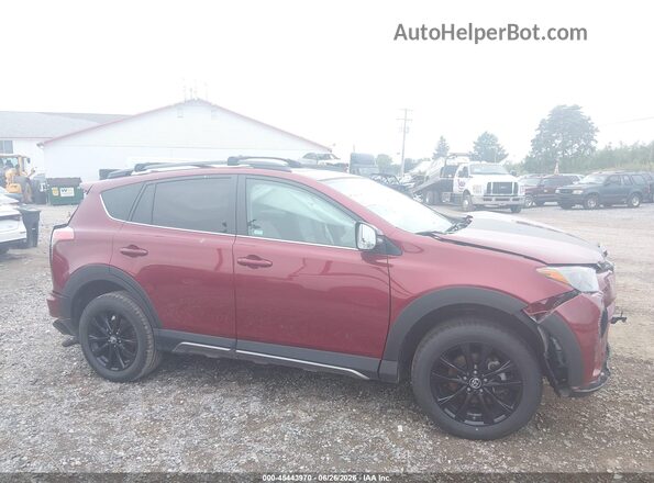 2T3RFREV4JW836096 2018 TOYOTA RAV4 Red Vista interior trasera