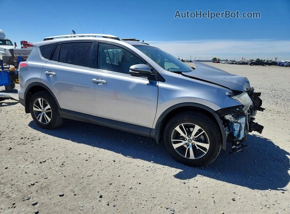 2T3RFREV5GW416467 2016 TOYOTA RAV4 Silver 
