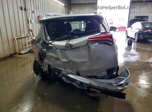 2T3RFREV5GW452305 2016 TOYOTA RAV4 Silver Вид ззаду