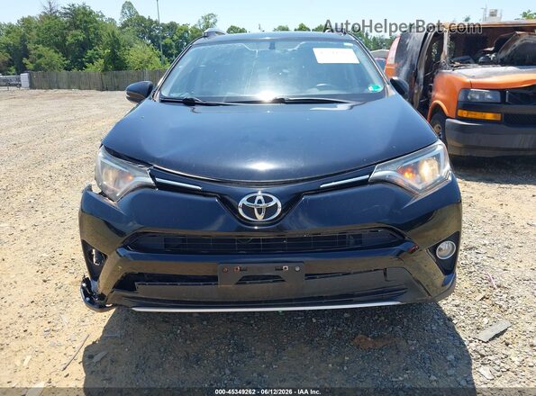 2T3RFREV5GW463966 2016 TOYOTA RAV4 Black უკანა სალონის ხედი