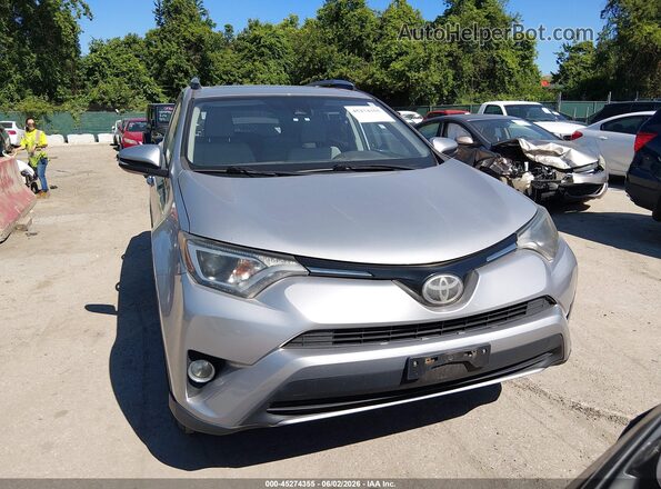 2T3RFREV5HW560229 2017 TOYOTA RAV4 Серебряный Вид щитка приборов