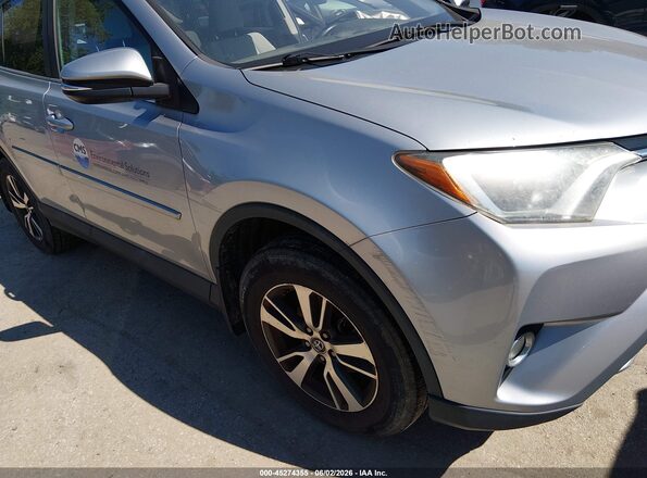2T3RFREV5HW560229 2017 TOYOTA RAV4 Серебряный 