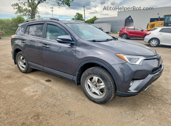 2T3RFREV5JW724388 2018 TOYOTA RAV4 Gray Front right
