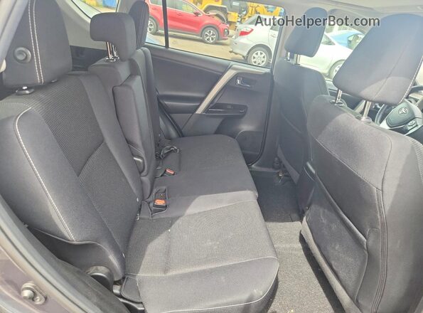 2T3RFREV5JW724388 2018 TOYOTA RAV4 Gray Rear seats view
