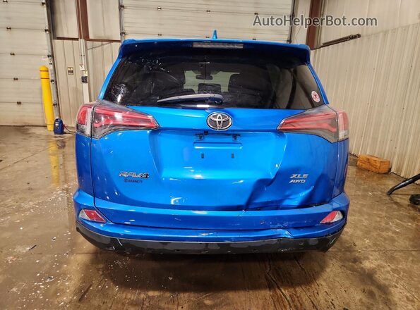 2T3RFREV5JW798619 2018 TOYOTA RAV4 Blue უკანა ხედი