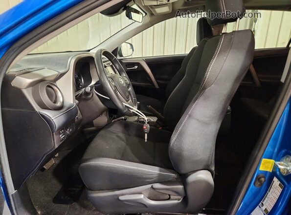 2T3RFREV5JW798619 2018 TOYOTA RAV4 Blue წინა სალონის ხედი