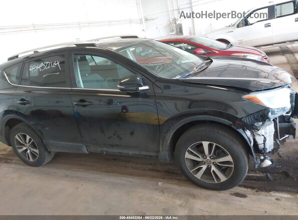 2T3RFREV6GW495339 2016 TOYOTA RAV4 Black Սալոնի հետևի տեսք