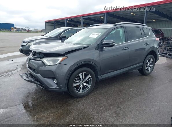 2T3RFREV6JW786818 2018 TOYOTA RAV4 Gray Front left