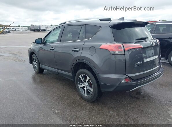 2T3RFREV6JW786818 2018 TOYOTA RAV4 Gray Rear left