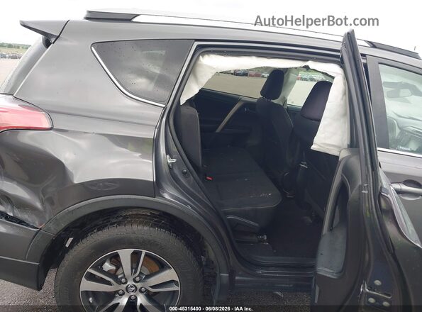 2T3RFREV6JW786818 2018 TOYOTA RAV4 Gray VIN sticker view