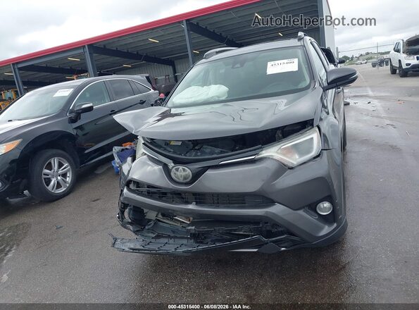 2T3RFREV6JW786818 2018 TOYOTA RAV4 Gray Instrument cluster view