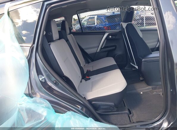 2T3RFREV7GW459885 2016 TOYOTA RAV4 Gray VIN կոդի պիտակի տեսք