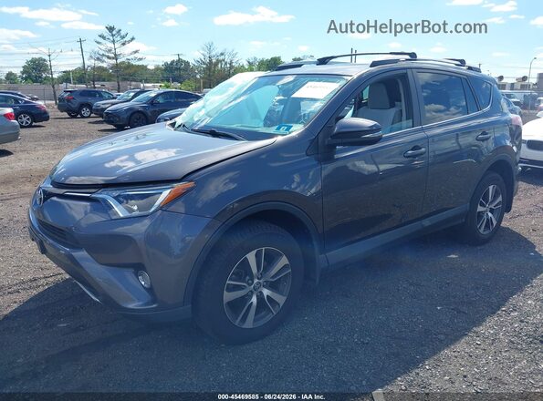 2T3RFREV7GW459885 2016 TOYOTA RAV4 Gray Առջևի ձախ երեք քառորդ տեսարան