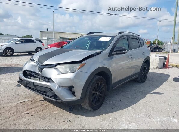2T3RFREV7JW696092 2018 TOYOTA RAV4 Silver წინა მარცხენა ხედი სამი მეოთხედიდან