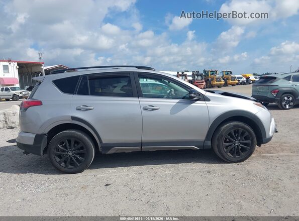 2T3RFREV7JW696092 2018 TOYOTA RAV4 Silver უკანა სალონის ხედი
