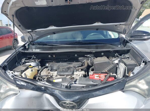 2T3RFREV7JW696092 2018 TOYOTA RAV4 Silver უკანა ხედი
