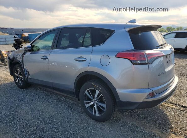 2T3RFREV7JW816330 2018 TOYOTA RAV4 Silver Rear left