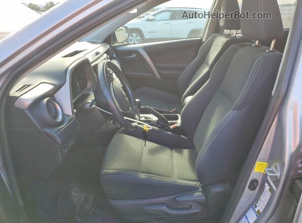 2T3RFREV7JW816330 2018 TOYOTA RAV4 Silver Front interior view