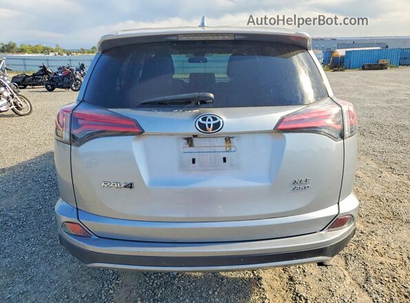 2T3RFREV7JW816330 2018 TOYOTA RAV4 Silver Rear view