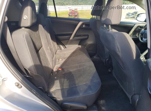 2T3RFREV7JW816330 2018 TOYOTA RAV4 Silver Rear seats view